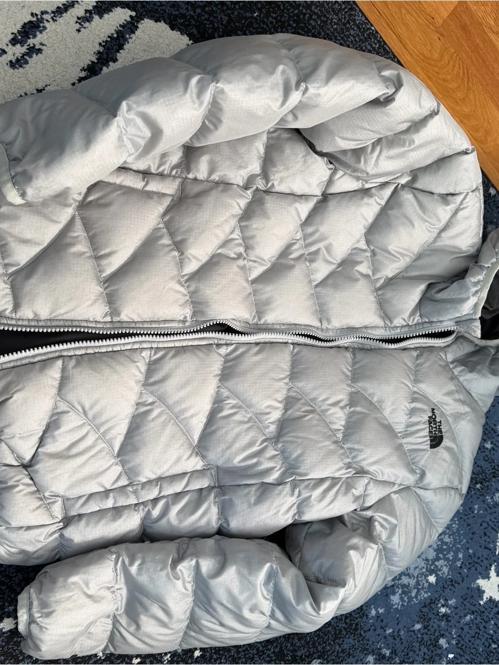 The North Face Kids Black Hooded Puffer Jacket with Light Gray Trim